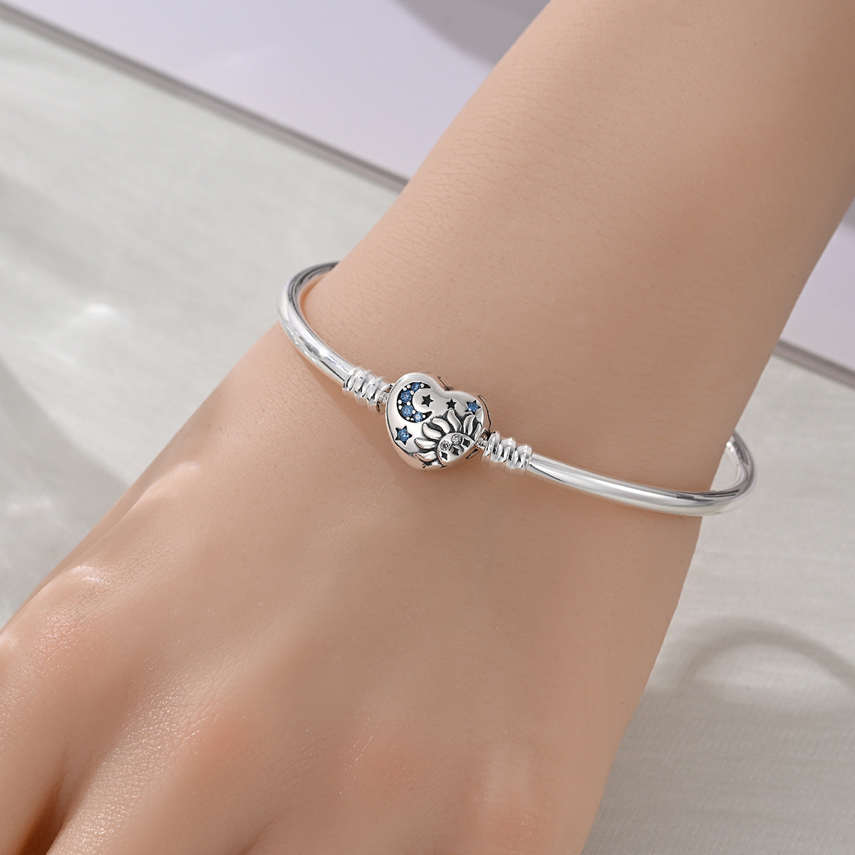 Love Star & Moon Bracelet – Silver-Plated Snake Bone and Flower-de-Luce Design