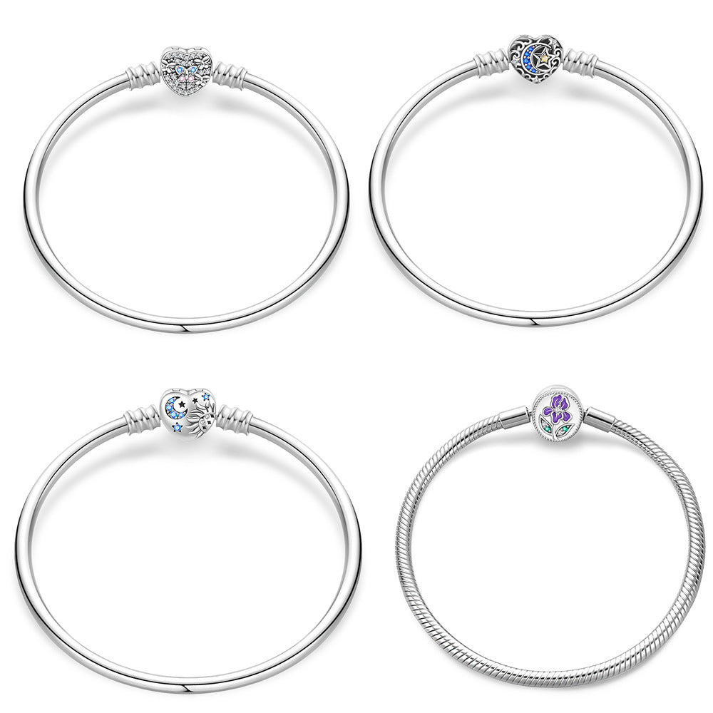 Love Star & Moon Bracelet – Silver-Plated Snake Bone and Flower-de-Luce Design