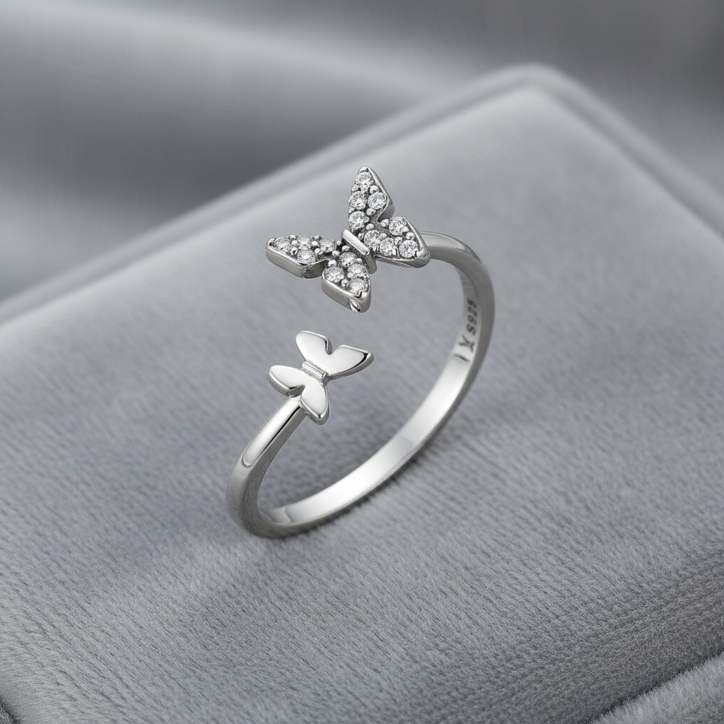 Double Butterfly Ring on Grey Velvet