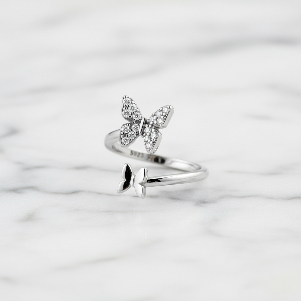 Double Butterfly Ring on White Marble