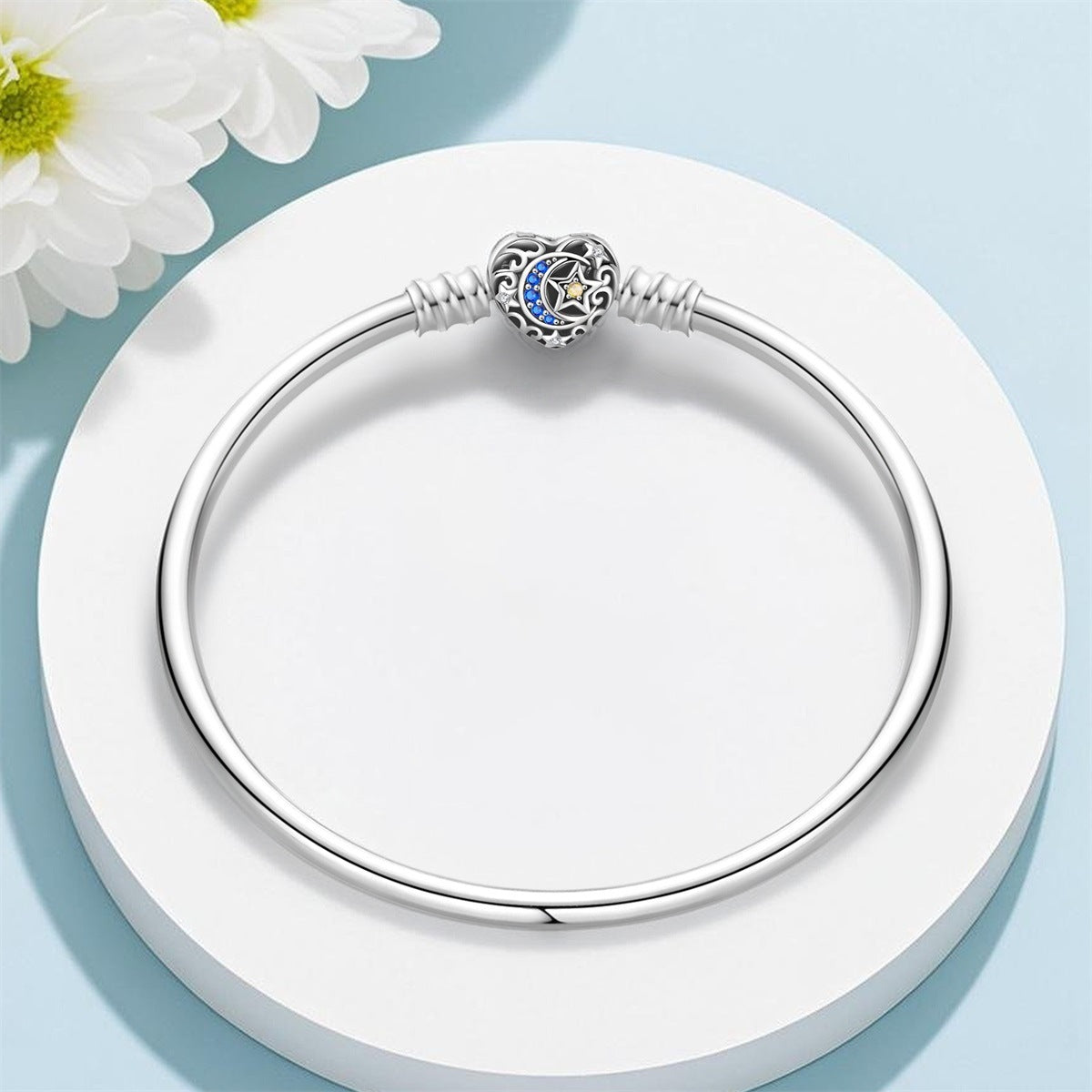 Love Star & Moon Bracelet – Silver-Plated Snake Bone and Flower-de-Luce Design