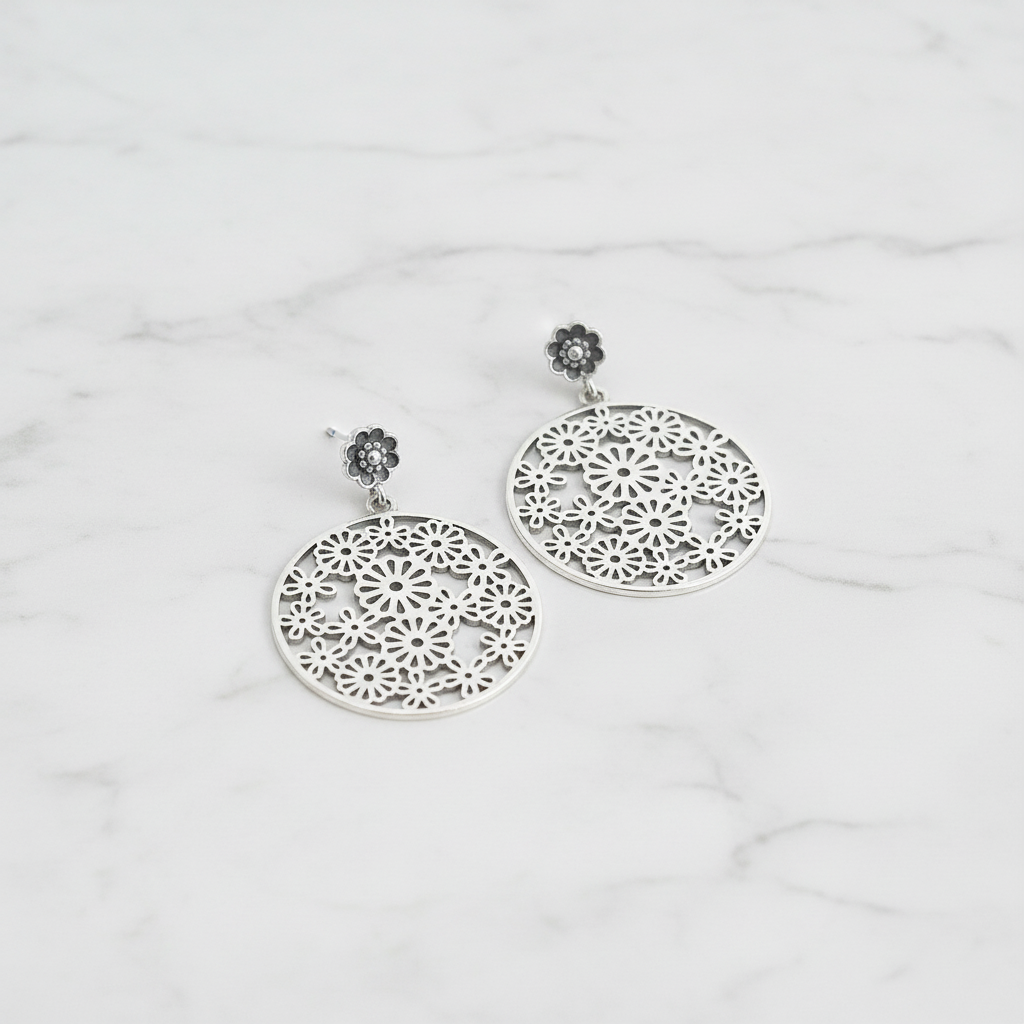 Filigree Earrings on White Marble
