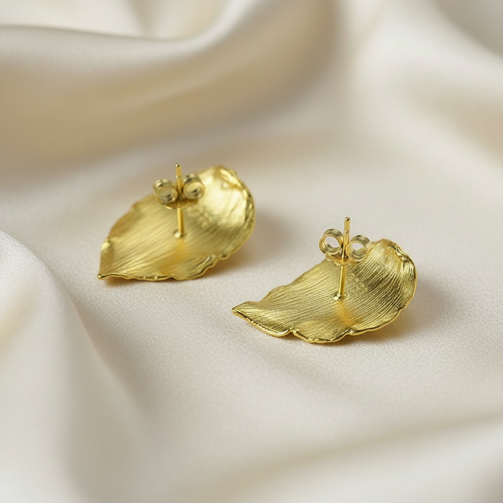 Gold Leaf Earrings Back View on Cream Silk