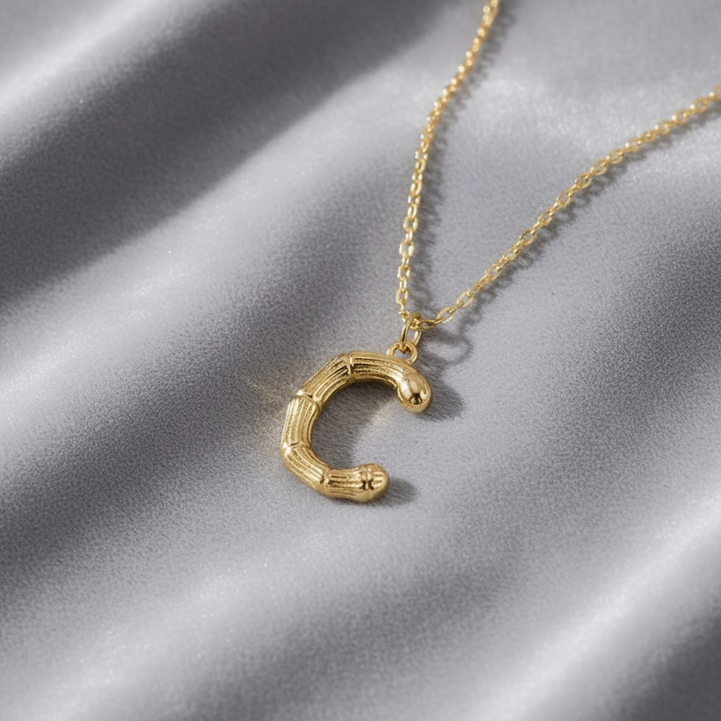 Gold Letter C on Grey Velvet