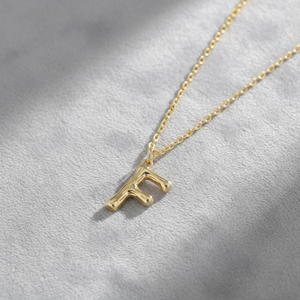 Gold Letter F on Grey Velvet