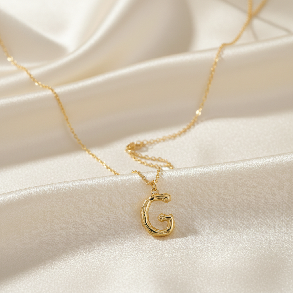 Gold Letter G on Cream Silk