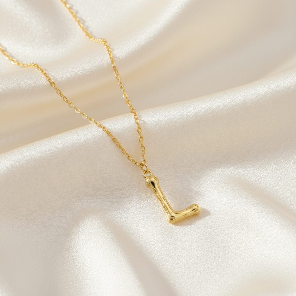 Gold Letter L on Cream Silk