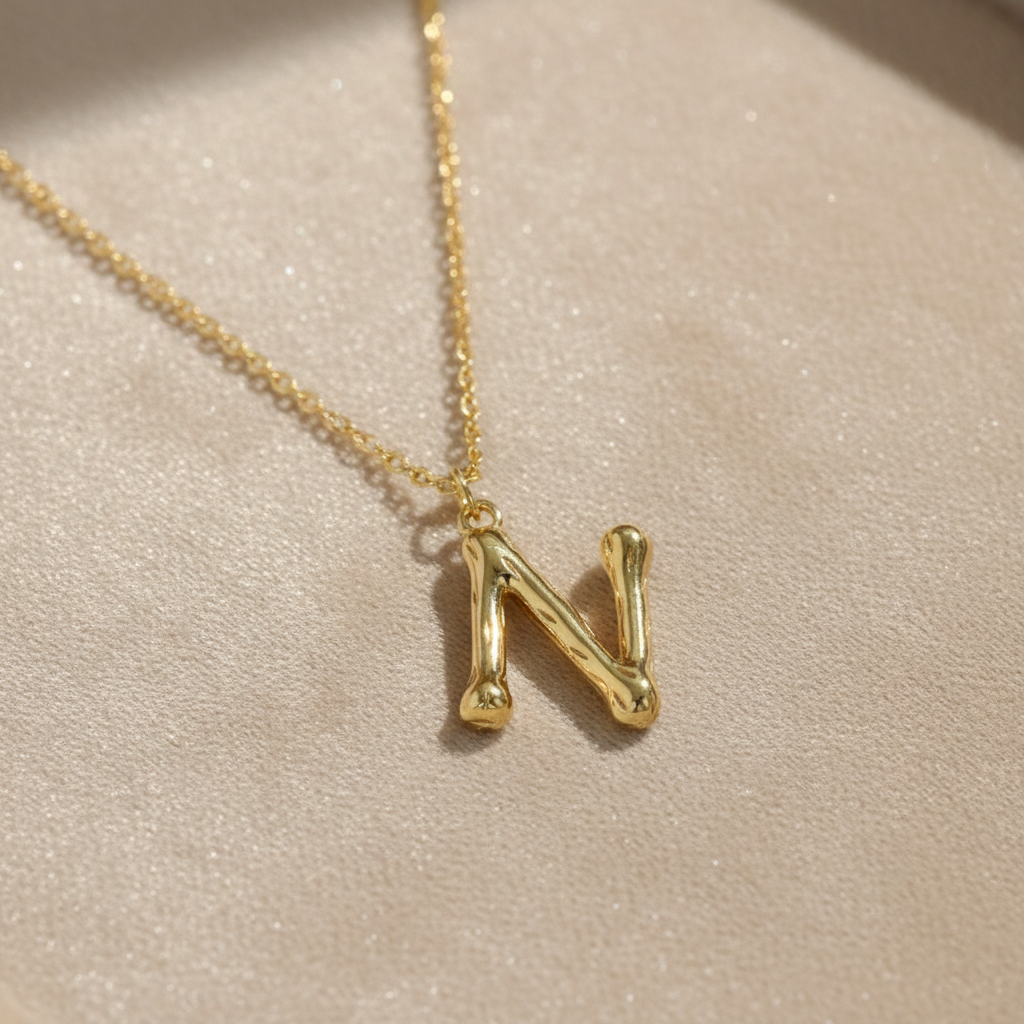 Gold Letter N on Champagne Velvet