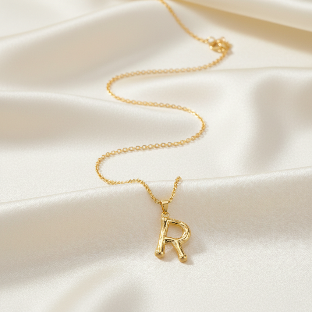 Gold Letter R on Cream Silk