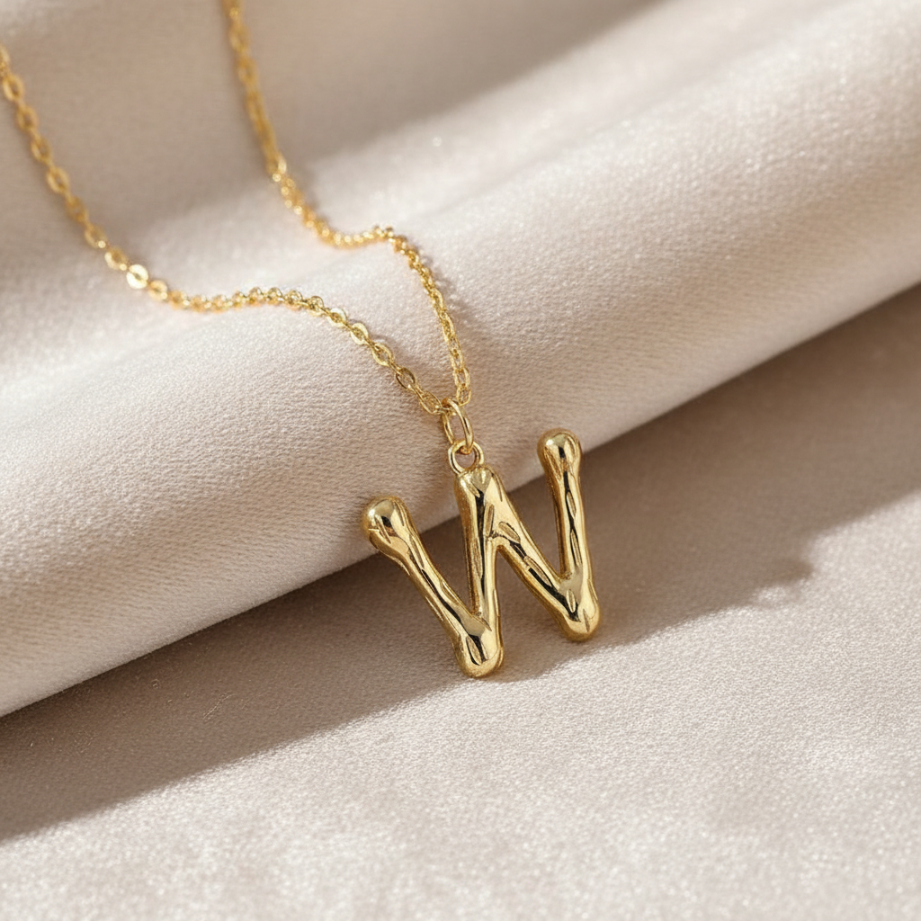 Gold Letter W on Champagne Velvet