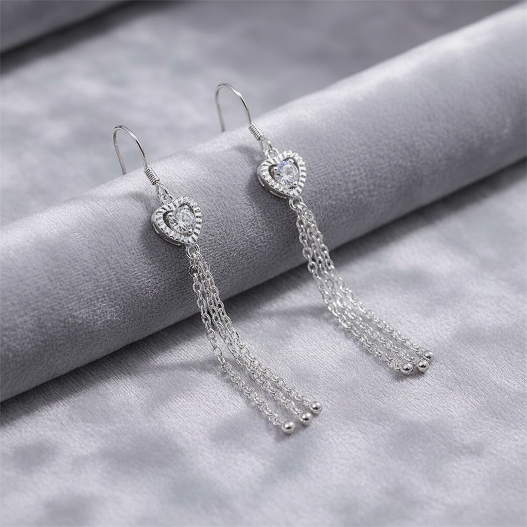 Heart Tassel Earrings on Grey Velvet