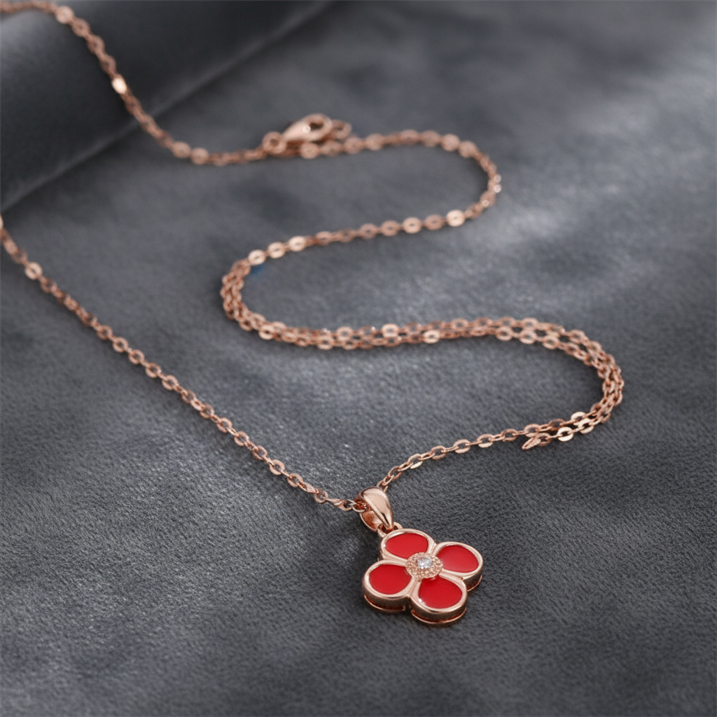 Rose Gold Red Enamel Clover Necklace on Grey Velvet